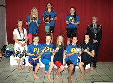 Event 27 - Girls 100m Backstroke finalists